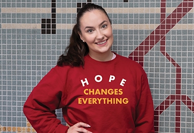 Olivia Lancellotta in Hope Changes Everything sweatshirt
