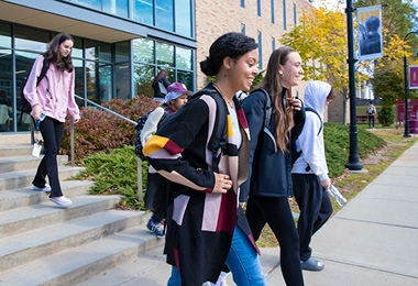 Students walking down steps of Gaige Hall
