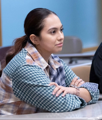 Grad MSW student listening at table