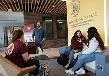 Students talking in Horace Mann lobby