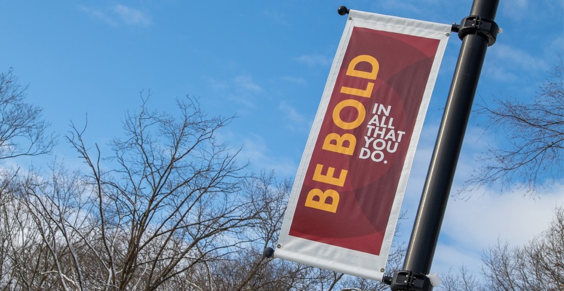 Be Bold In All You Do Banner on Campus Quad