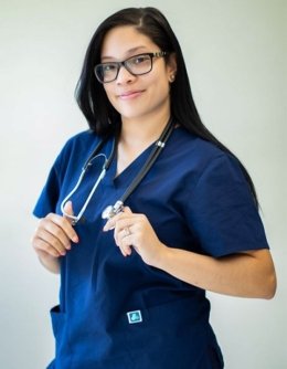 Nursing student in scrubs with stethoscope